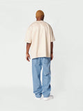 Calça Stynvo Denim reta com bordado