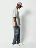 Calça Stynvo Denim reta com bordado