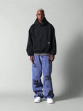 Calça Jeans Folgada Com Distintivos