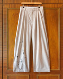 PLEATED WOOL FLOCK TROUSERS IN CREAM