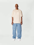 Calça Stynvo Denim reta com bordado