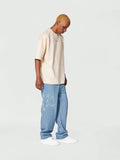 Calça Stynvo Denim reta com bordado
